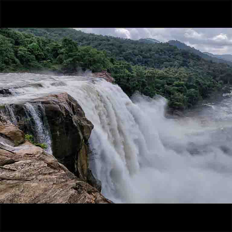 The music of the falls breaks the silence of the verdant forest nearby. Send this to the singer in your group