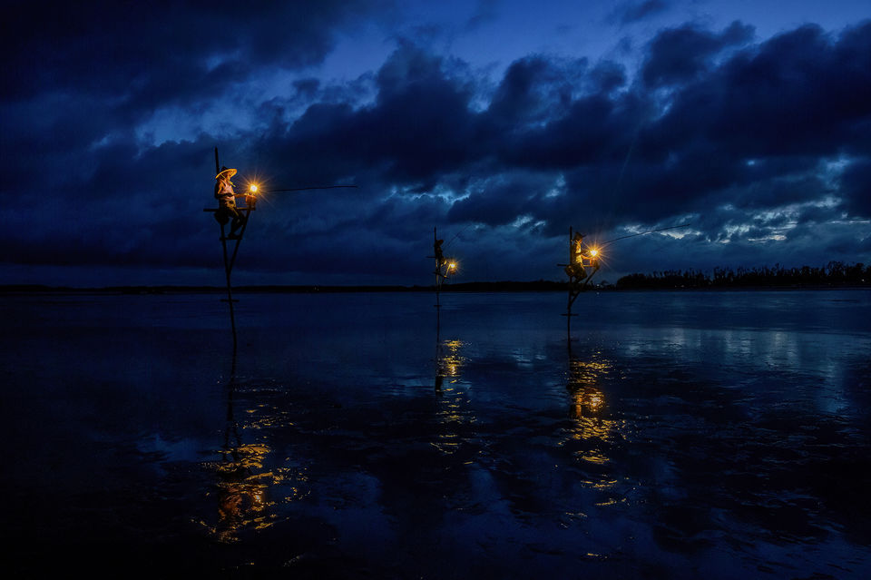 Photo of Stilt Fishing in West Bengal, India by Shibasish Saha