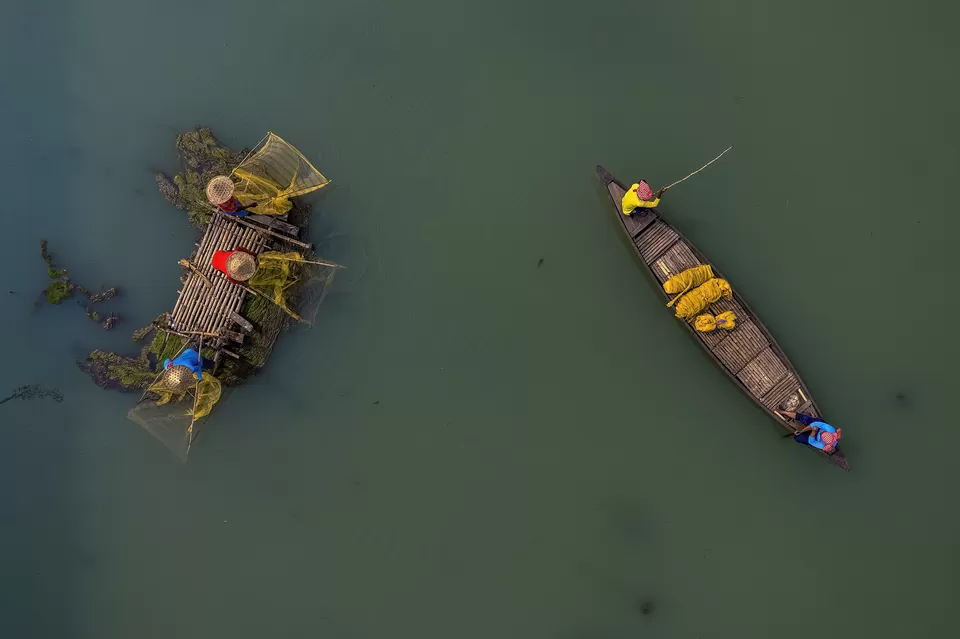 Photo of A Photographer's Delight: Fishermen At Work, Near Mossy River by Shibasish Saha