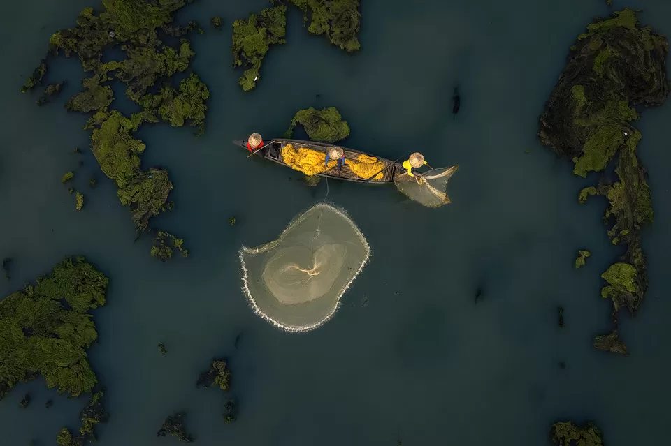 Photo of A Photographer's Delight: Fishermen At Work, Near Mossy River by Shibasish Saha