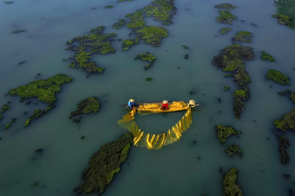 Photo of A Photographer's Delight: Fishermen At Work, Near Mossy River by Shibasish Saha
