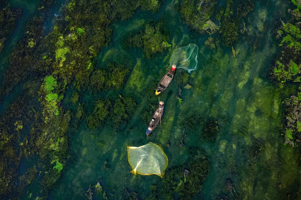Photo of A Photographer's Delight: Fishermen At Work, Near Mossy River by Shibasish Saha