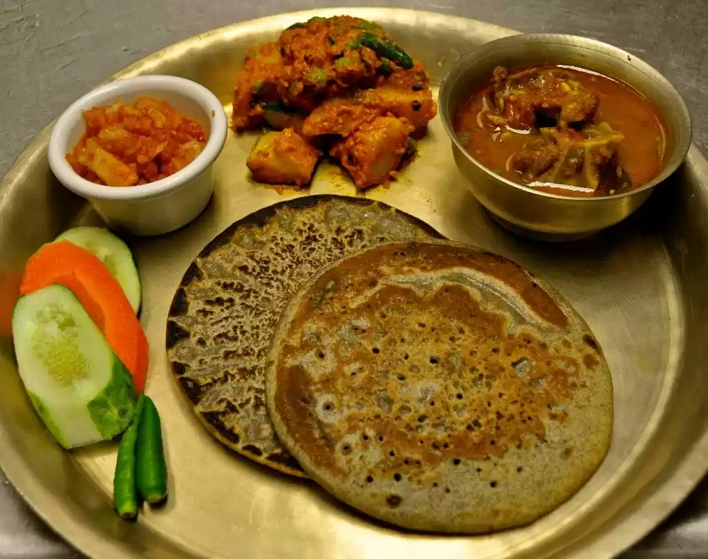 Local Sikkimese thali meal at mountain guesthouse North Sikkim adventure tour